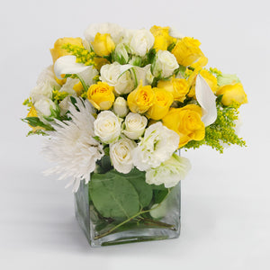 white roses and yellow lilies Exceptional Yellow and White Roses – Brattle Square Florist